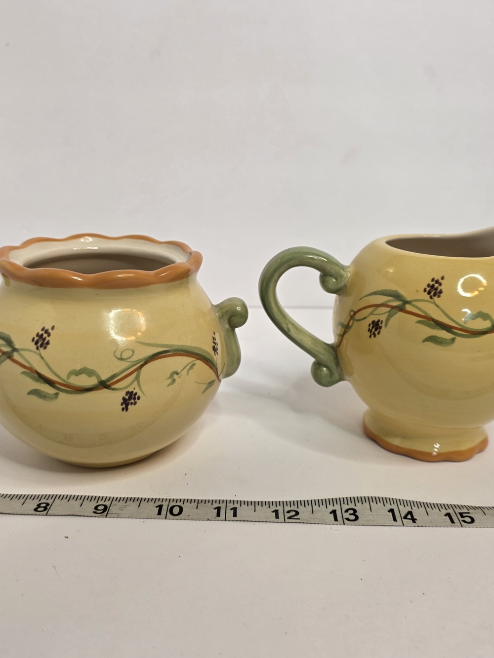 Pfaltzgraff Yellow Sugar Bowl and Creamer with Green Handles and Orange Trim